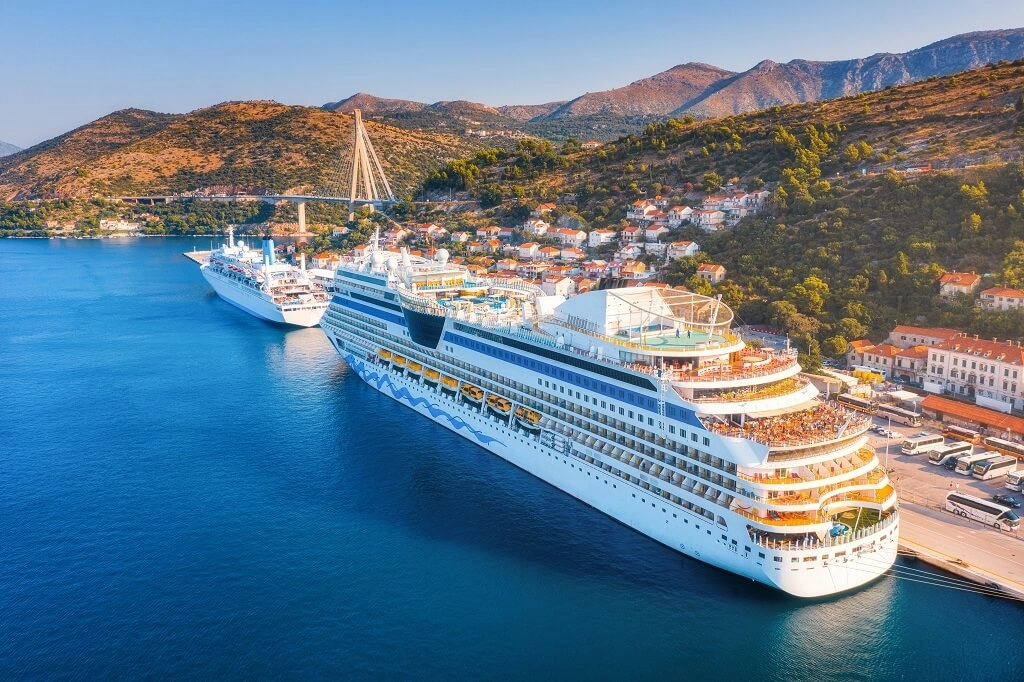 cruise-ship-harbor-aerial-view-beautiful-large-ships-boats-sunrise-landscape-with-boats-harbour-city-mountains-blue-sea-1